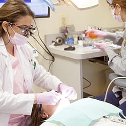 Dr. Ayati providing metal free dental restoration treatment to Fairfax patient