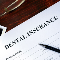 dental insurance form on table